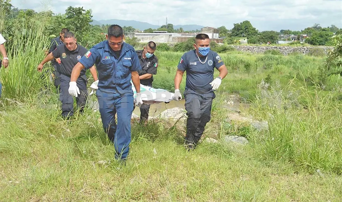 Encuentran cuerpo mutilado en río