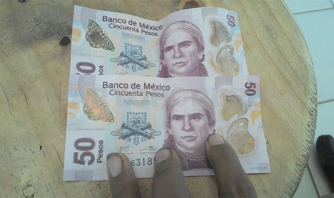 Denuncian circulación de billetes falsos