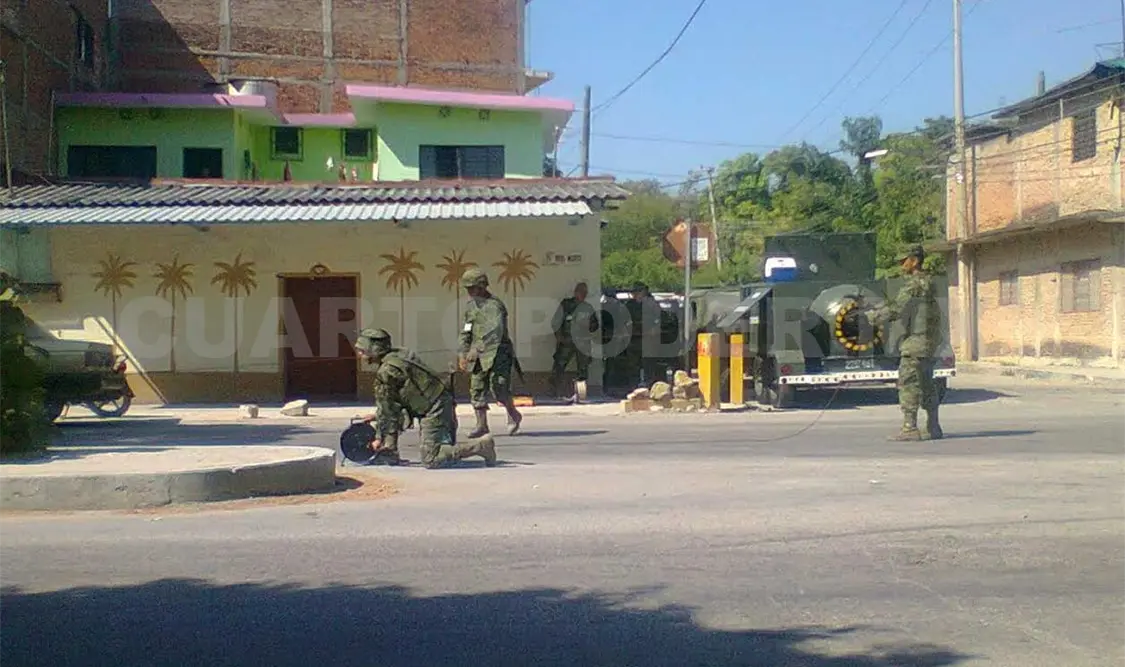 Hallan granadas en una jardinera