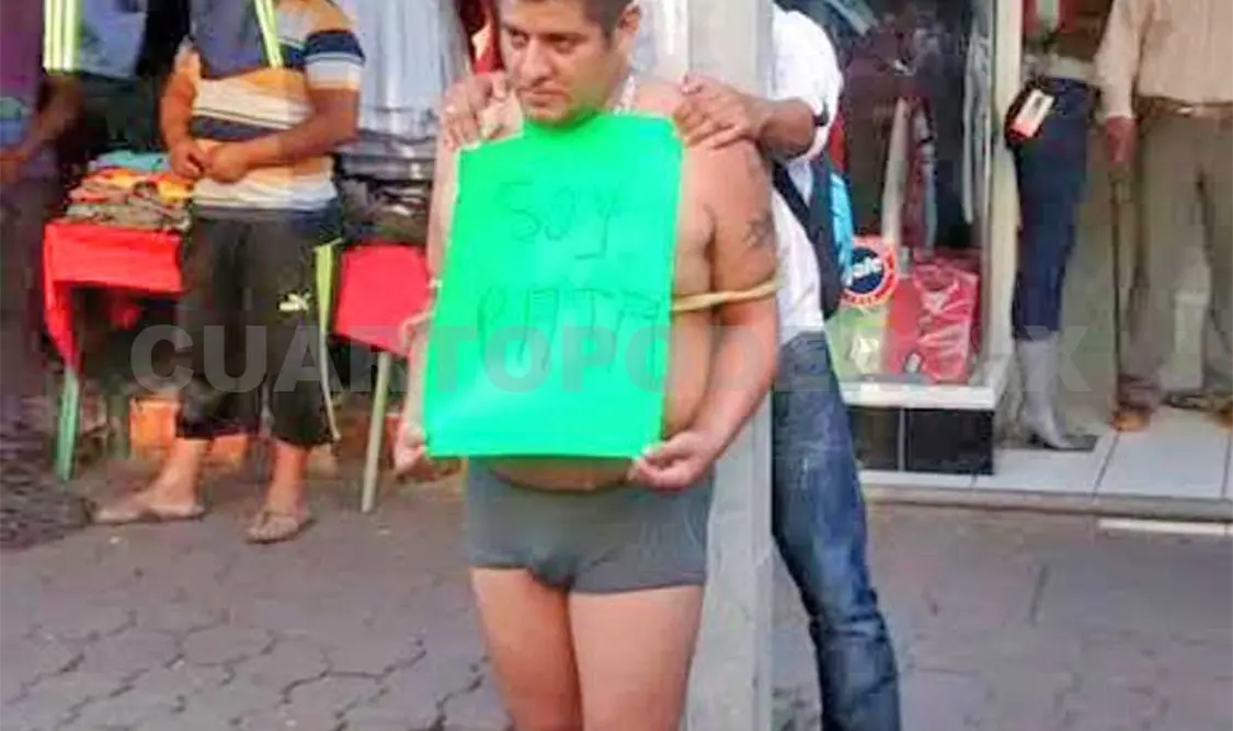 Retienen y exhiben a asaltante en calle