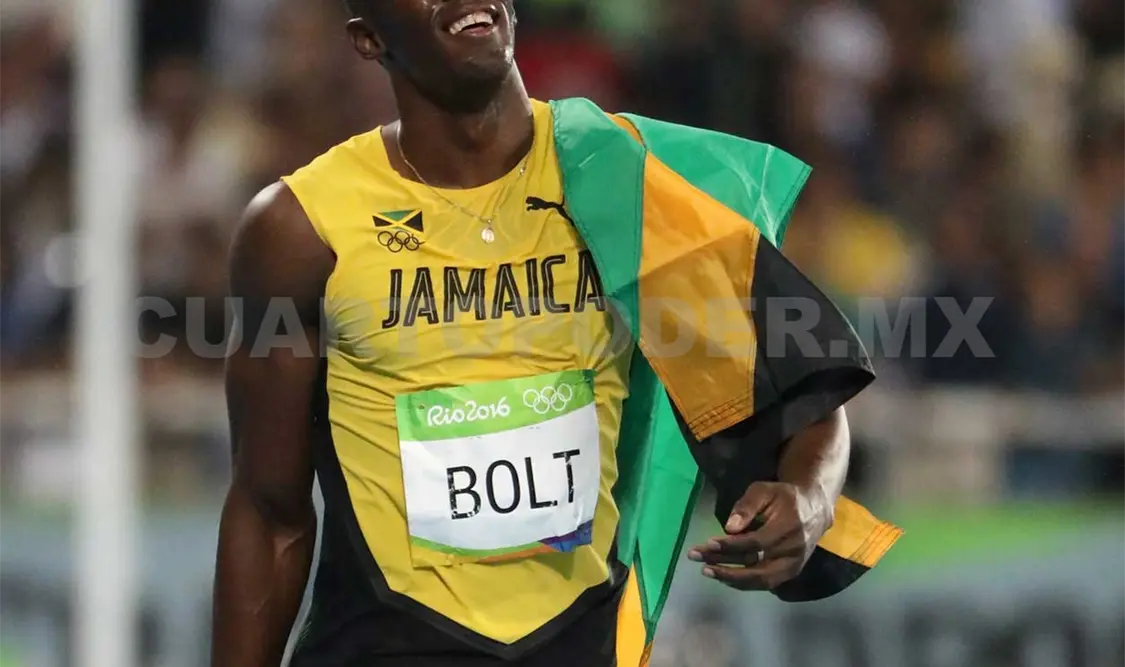 Usain Bolt, de Jamaica, ganador de la medalla de oro con 9.81 segundos. AP