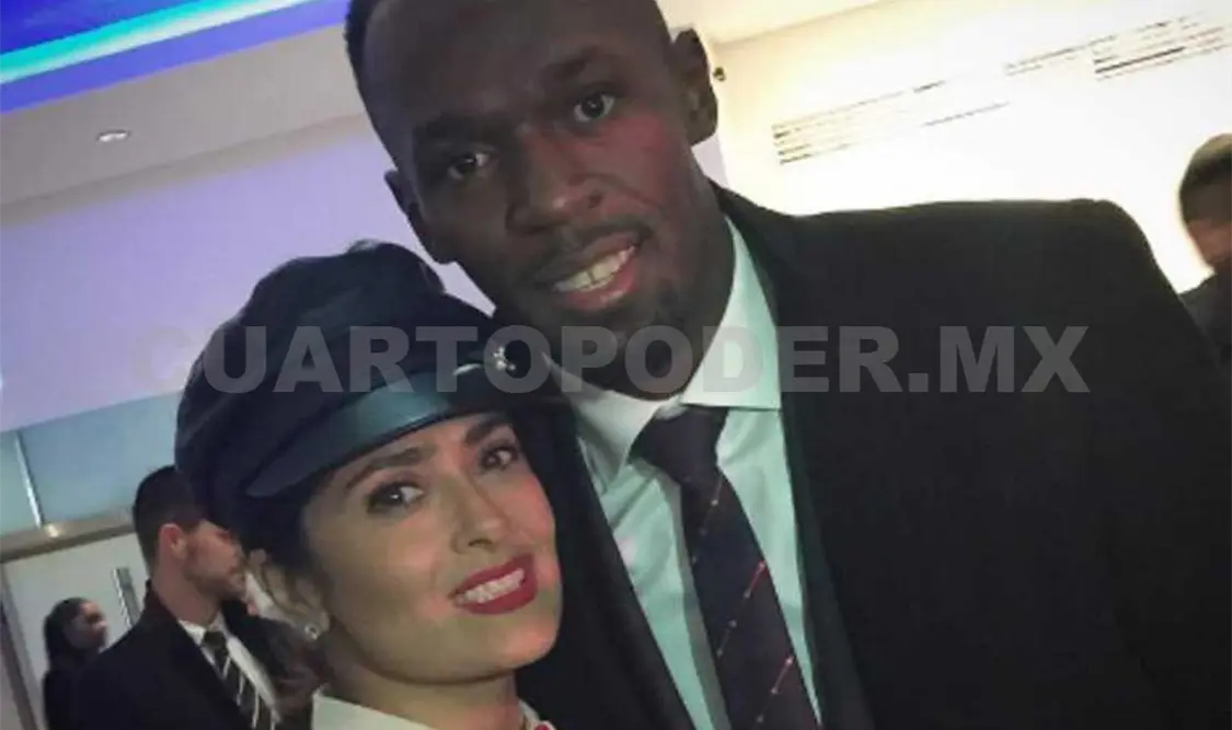 Salma Hayek posa con el hombre más rápido