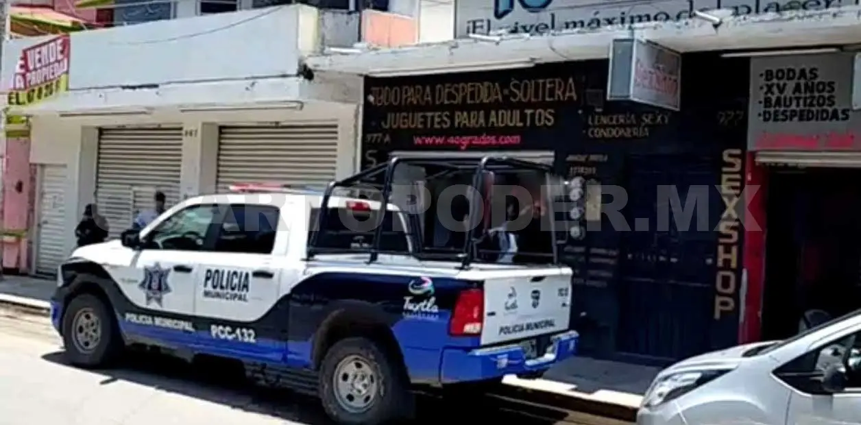 Pistoleros atracan una tienda Sex Shop