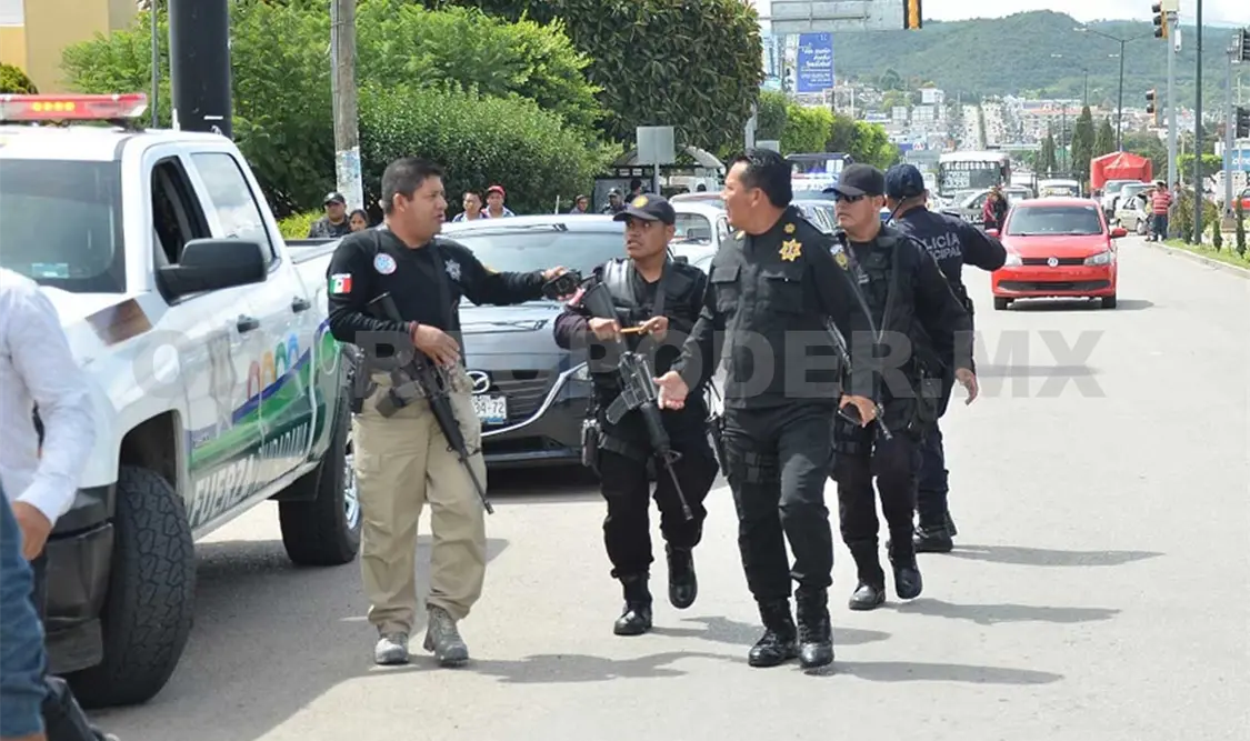Asalto a sucursal bancaria deja dos heridos y un detenido