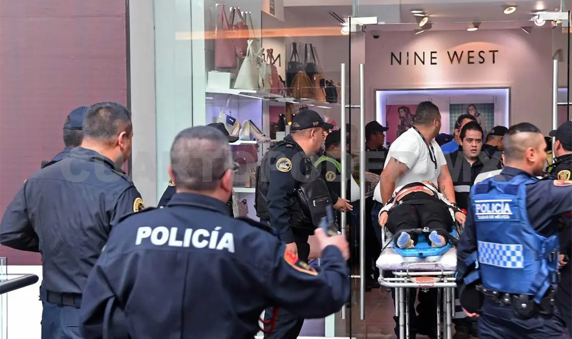 Dos heridos por balacera en plaza comercial
