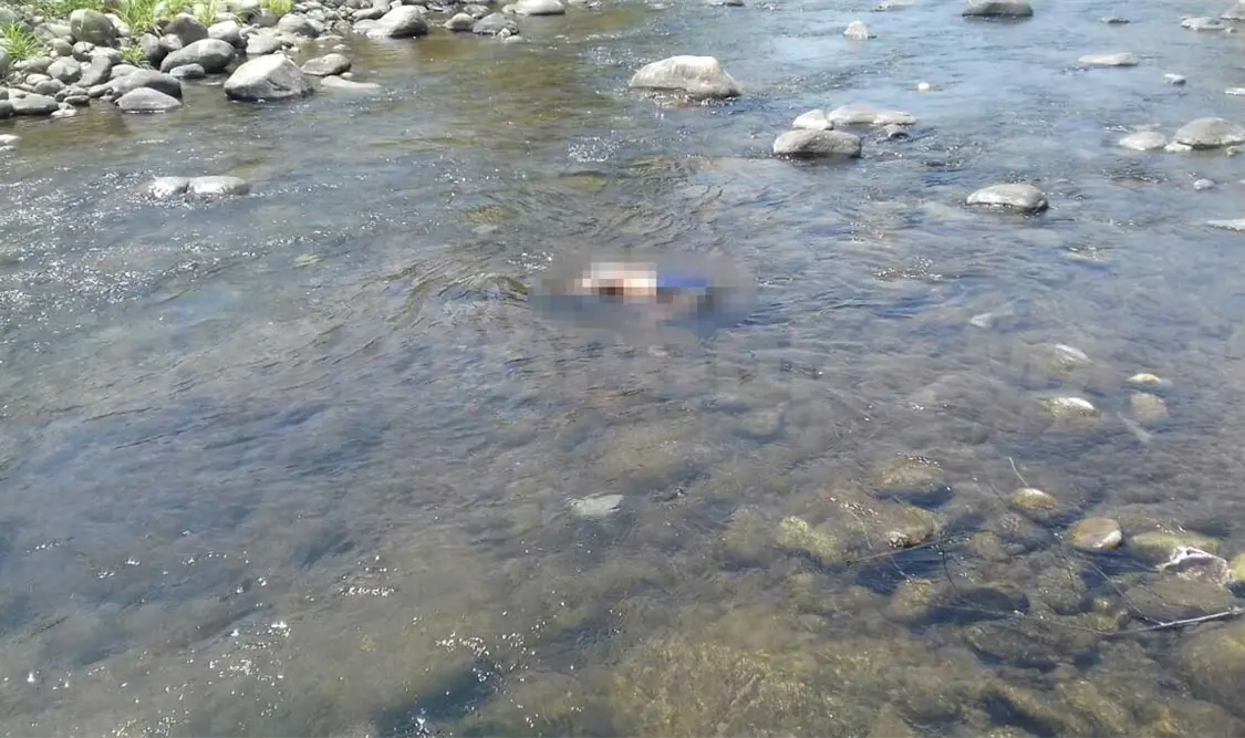 Torturado, asesinado y aventado al río
