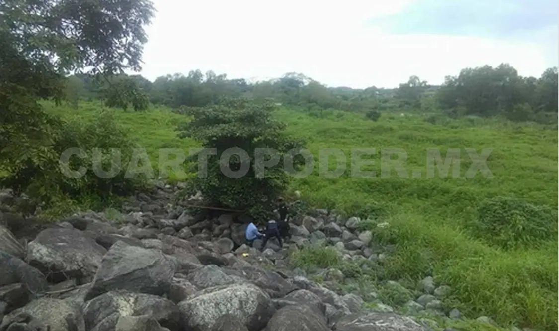 Localizan a octogenario muerto a orilla del río