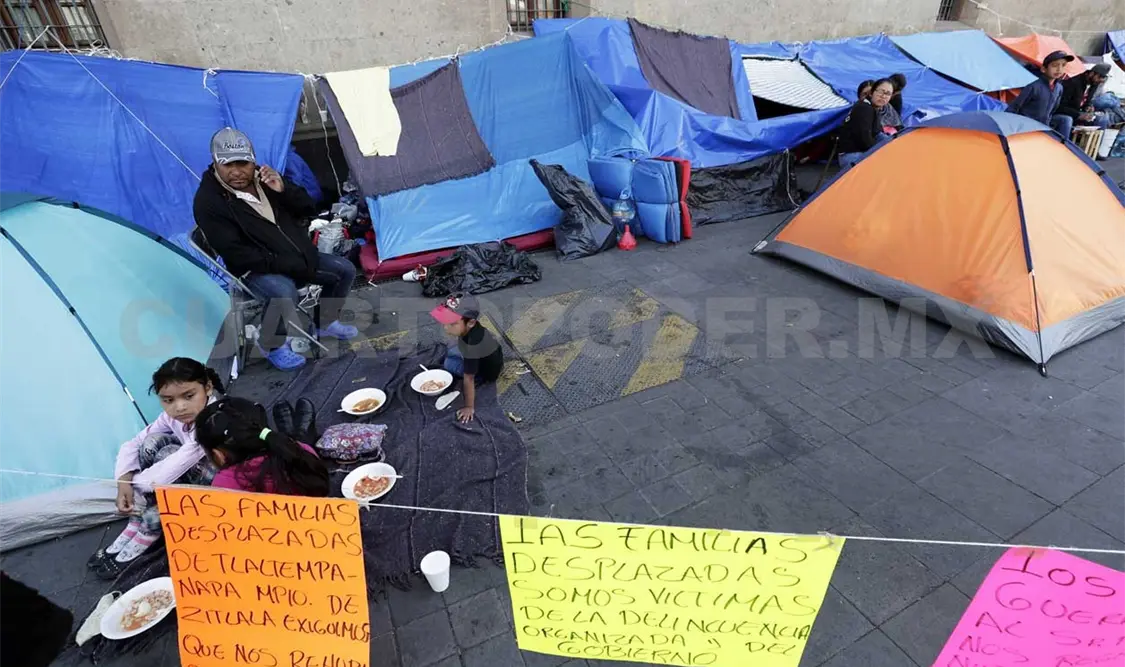 Esperan desplazados apoyo para volver a sus hogares