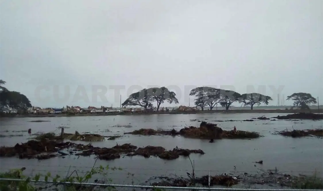 Lluvias afectan terrenos de Dos Bocas