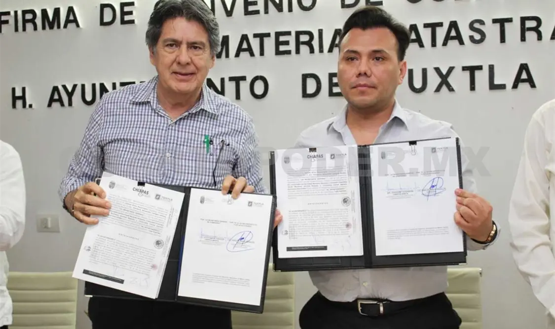 Firman convenio en materia catastral