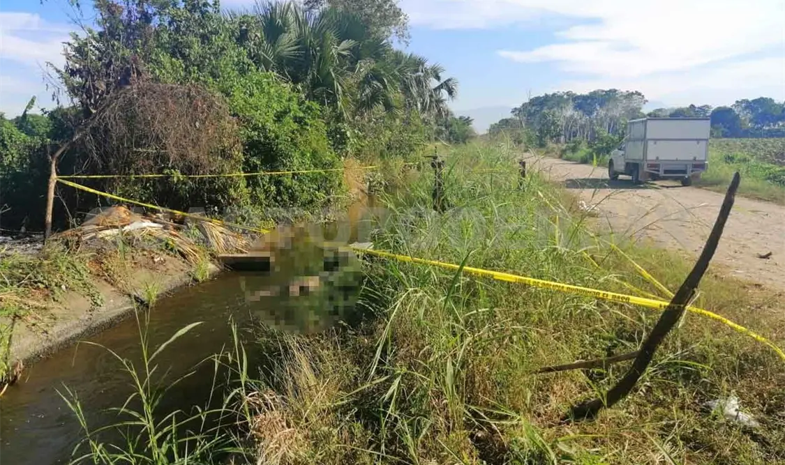 Asesinan a balazos y tiran en canal a MS-13