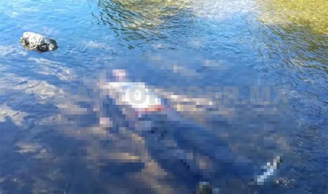 Encuentran un hombre muerto dentro de río