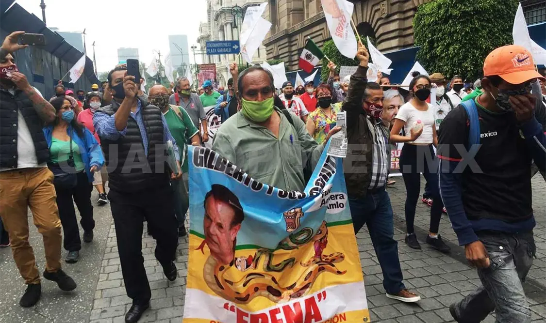 “Esta marcha es para apoyar a nuestro presidente”, expresó el grupo. El Universal