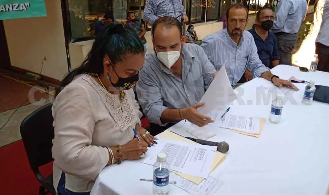 Evitan desalojo con firma de convenio