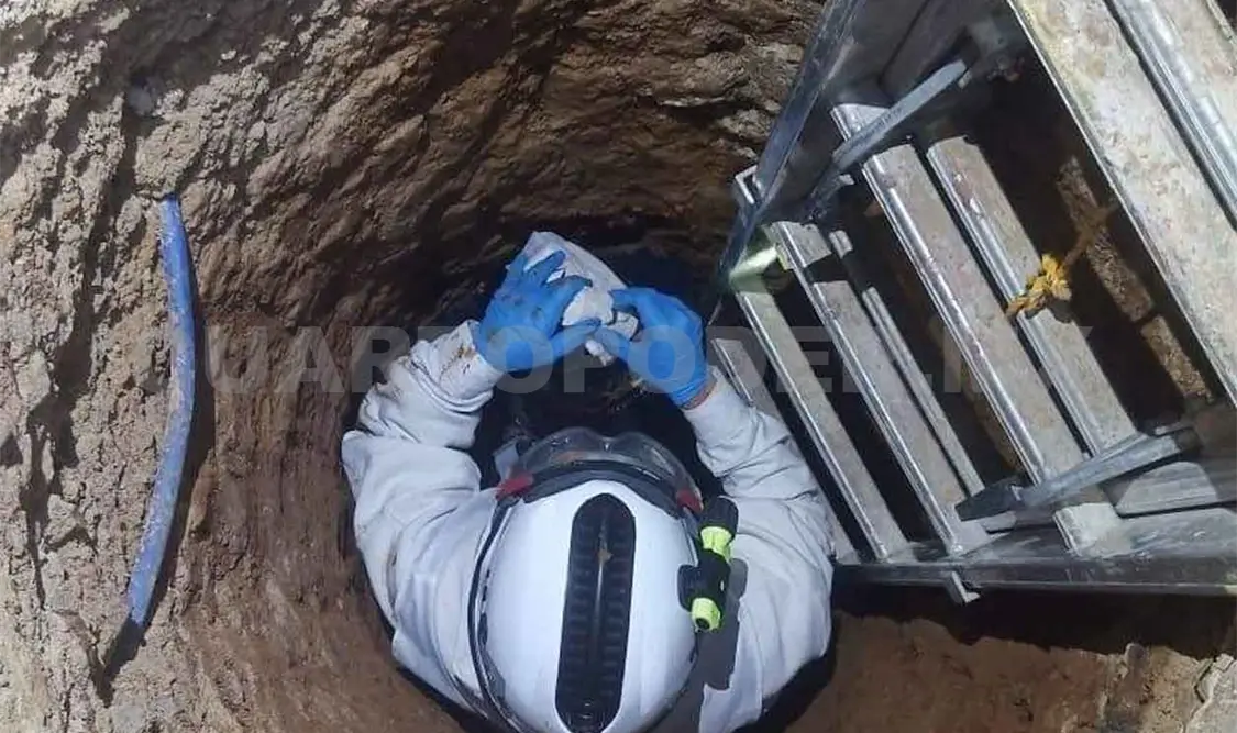 Rescatan a indigente atrapado en un pozo