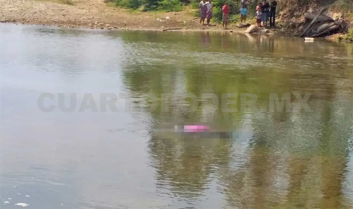 Encuentran cuerpo flotando en el río