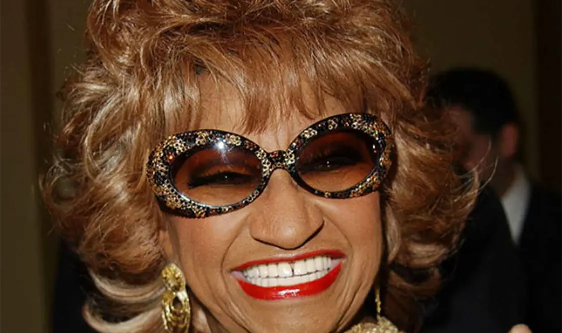 La historia de las pelucas de Celia Cruz