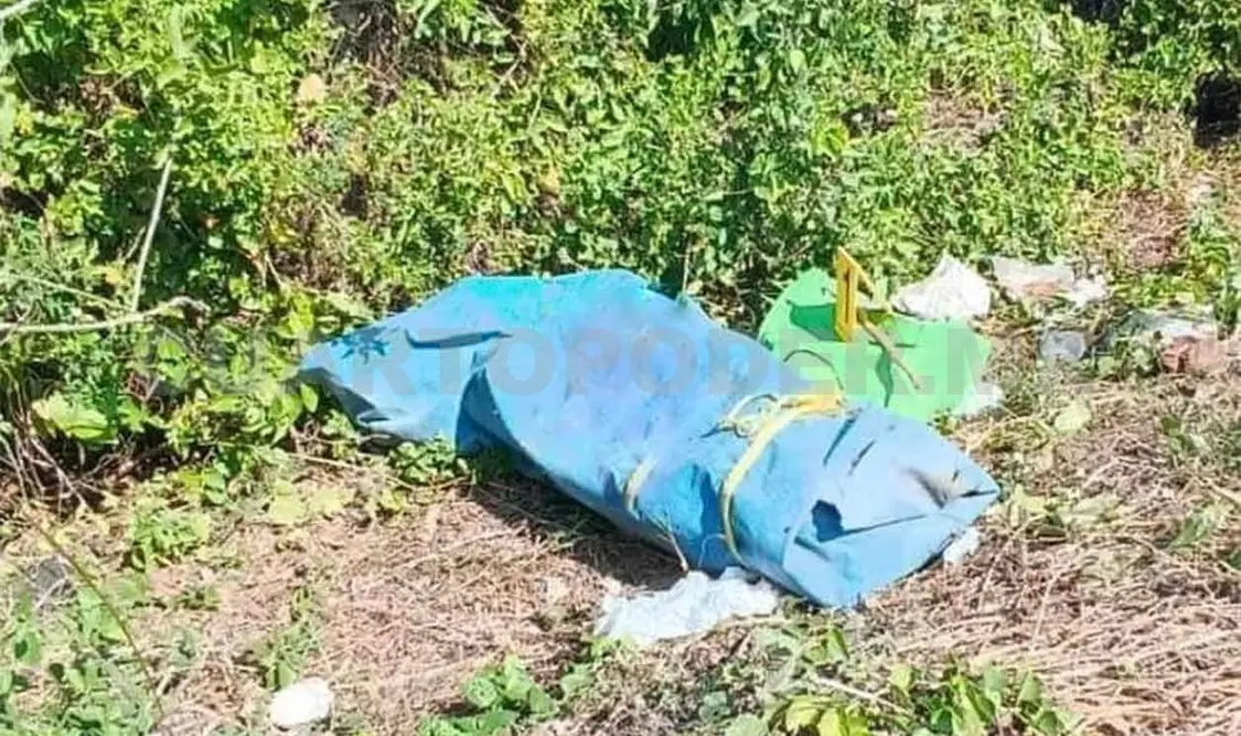La asesinan y la hallan envuelta en una lona