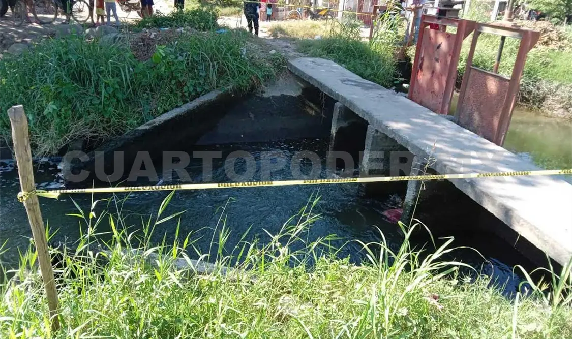 Localizan cuerpo de sujeto en canal de riego