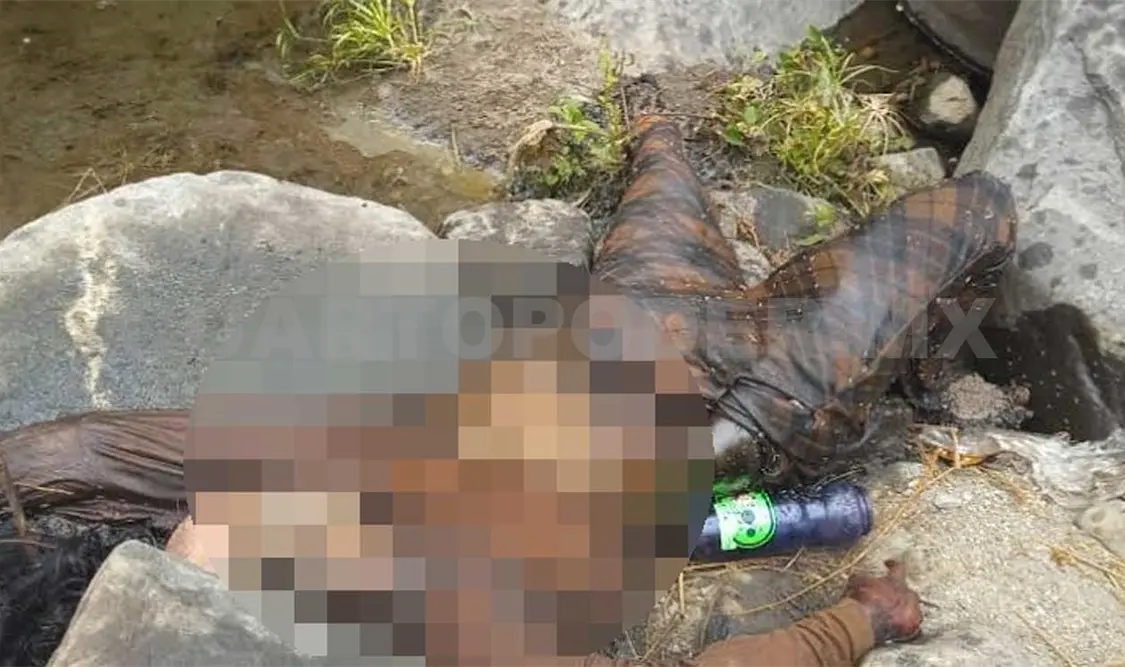 El cuerpo fue hallado junto al río y en avanzado estado de descomposición. Víctor Sánchez / CP