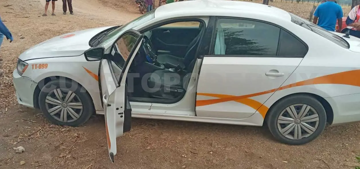 Asesinan a taxista a balazos junto a la carretera