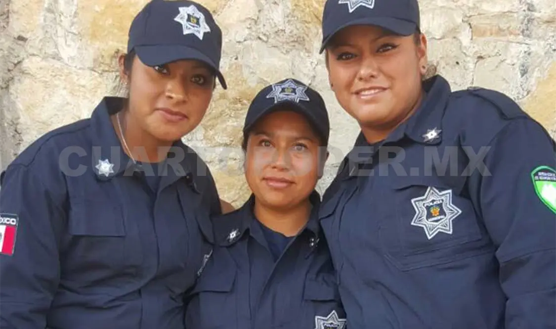 La agente en medio de sus compañeras. Cortesía