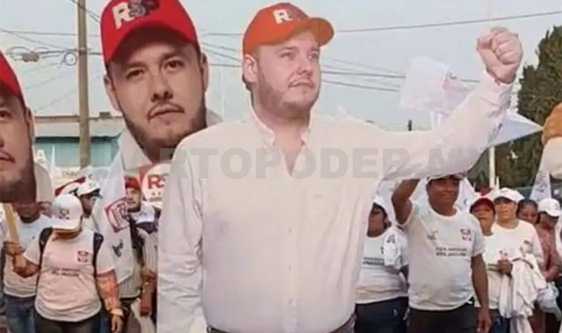 Candidato hace campaña solo con fotos gigantes