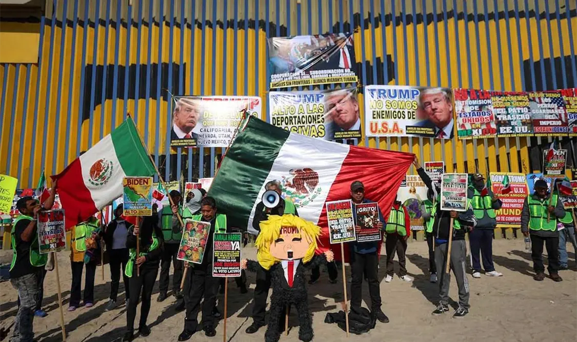 Castigan piñata de Donald frente a muro fronterizo