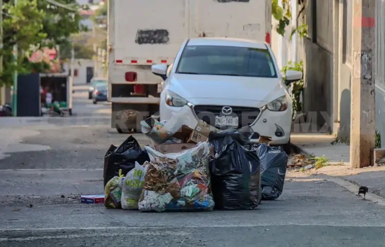 Basura en medio de la calle