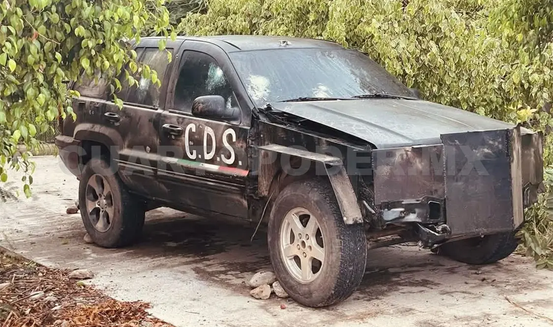 Encuentran camioneta blindada y arsenal