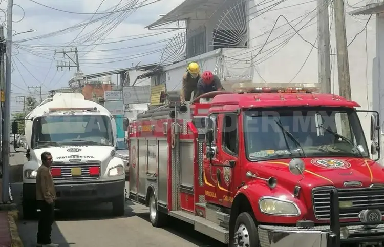 Se incendian dos despachos en la zona centro