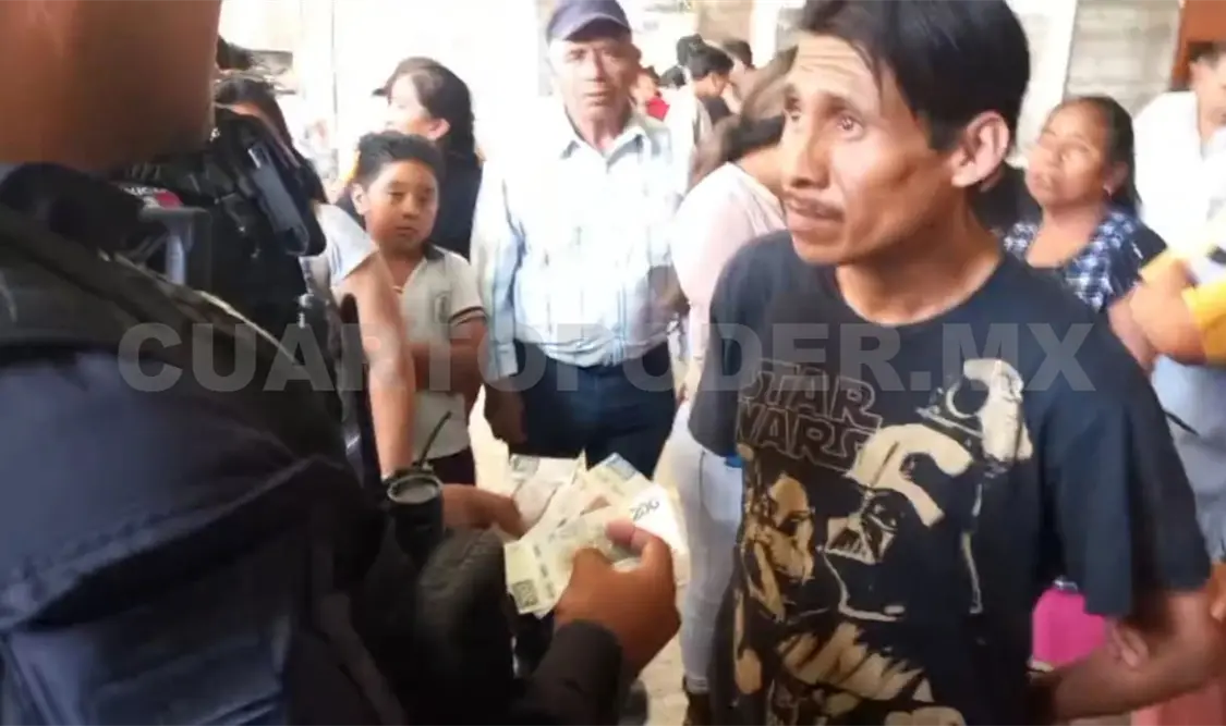 Grupo de locatarios  retiene a estafador