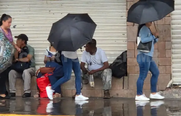 Lluvias afectan actividad económica de comercios