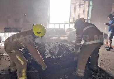 Se incendia habitación en barrio; bombero intoxicado