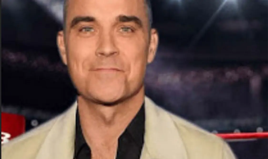 Robbie desea abrir concierto de Oasis