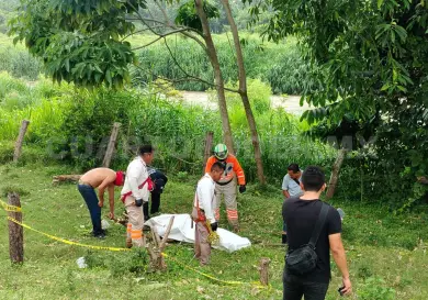Localizan sin vida a joven arrastrado por río