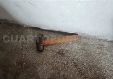 La asesinan con un marro dentro de su hogar