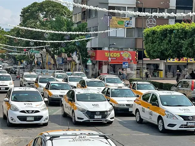En desacuerdo taxis y automóviles de plataforma En desacuerdo taxis y automóviles de plataforma