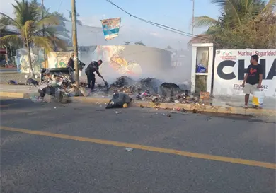 Dos detenidos por quemar contenedores Dos detenidos por quemar contenedores