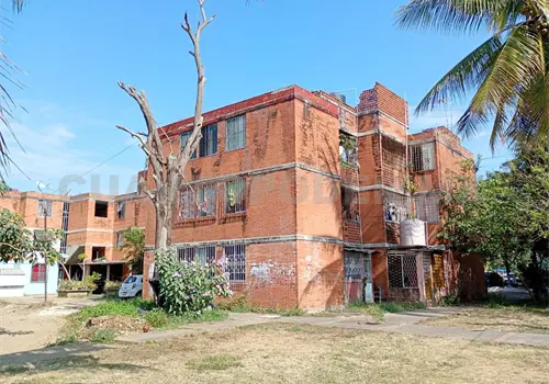 Se&ntilde;alan a migrantes por invasi&oacute;n de condominios