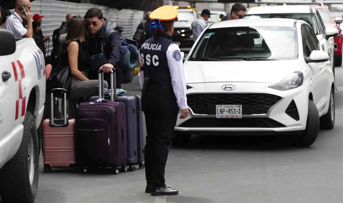 GN solo amonesta a Uber y DiDi en el AICM