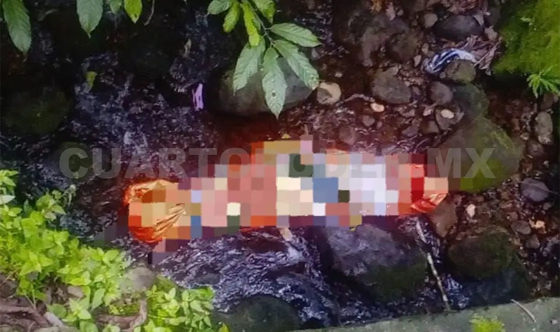 El cadáver se encontraba envuelto en una lona. Cortesía