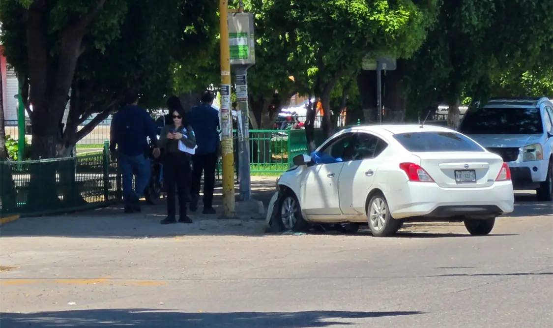 Asesinan a un par de hombres frente al Palacio de Gobierno