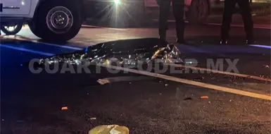 Perece turista en moto impactado por camión Perece turista en moto impactado por camión